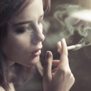 Teen girl smoking cropped-shutterstock_108536432